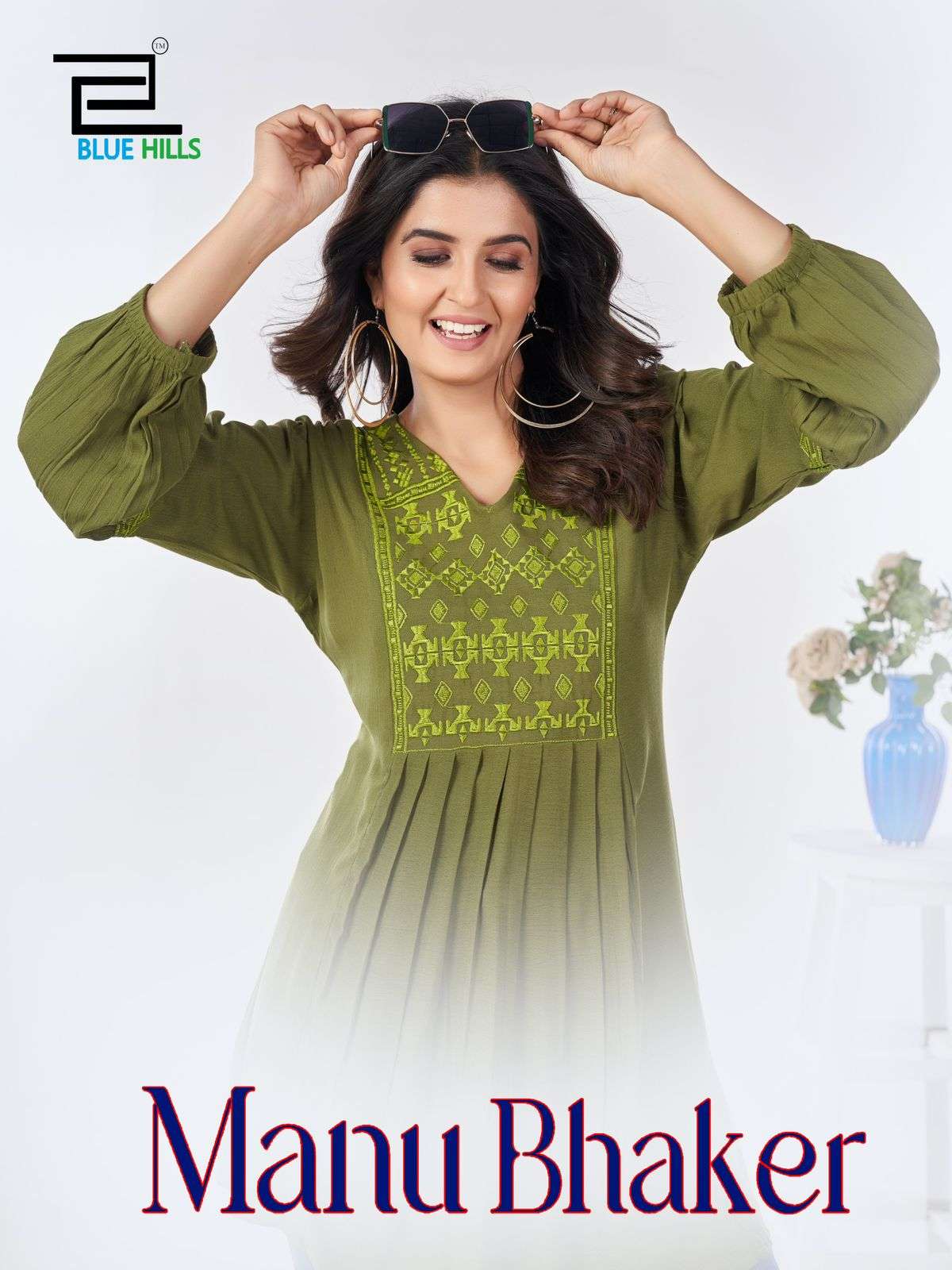 MANU BHAKER RAYON 14 KG RAYON RINKLE EMBROIDERY WORK FANCY TOP BY BLUE HILLS BRAND WHOLESALER AND DE...